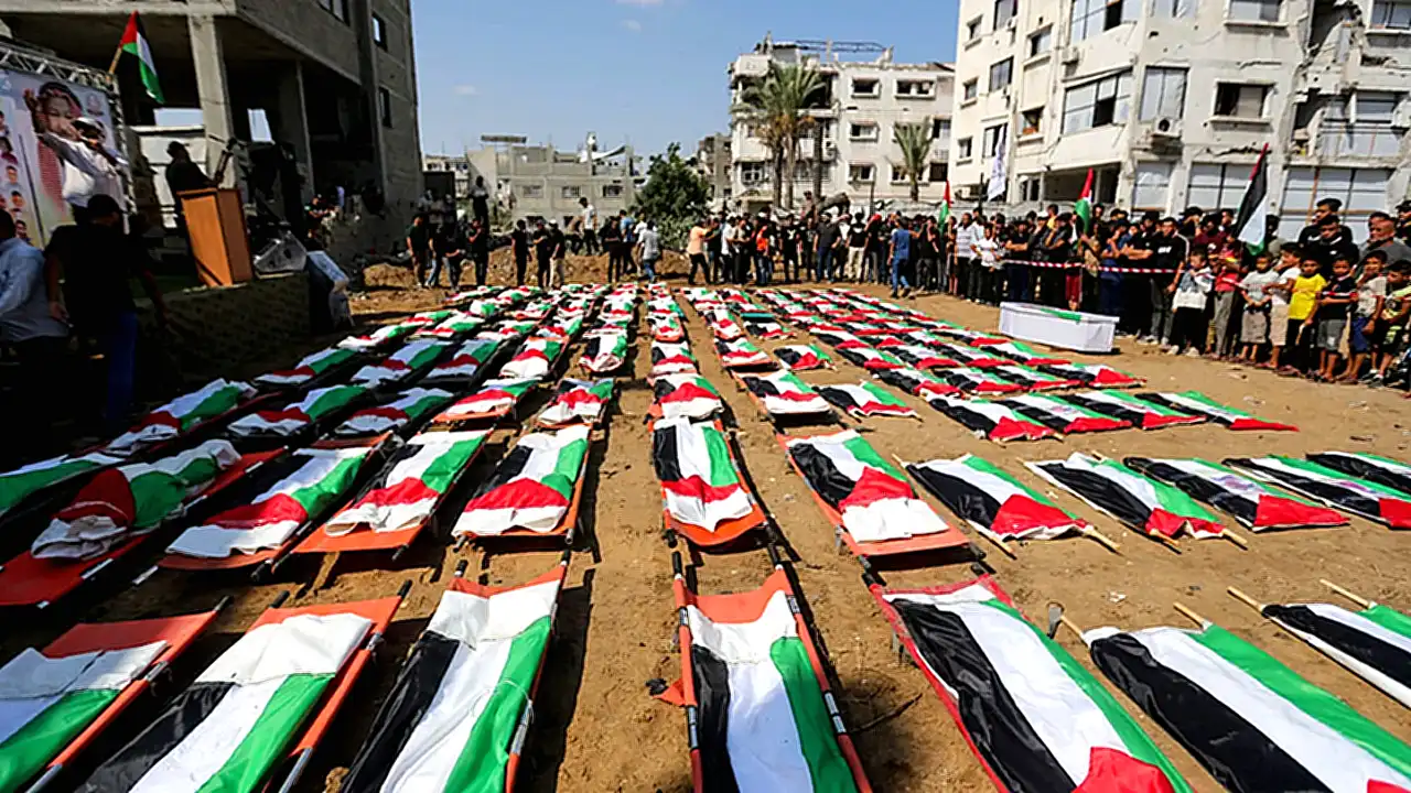 تشييع جماعي غزة صورة أرشيفية لتشييع جماعي في غزة لـ 112 من