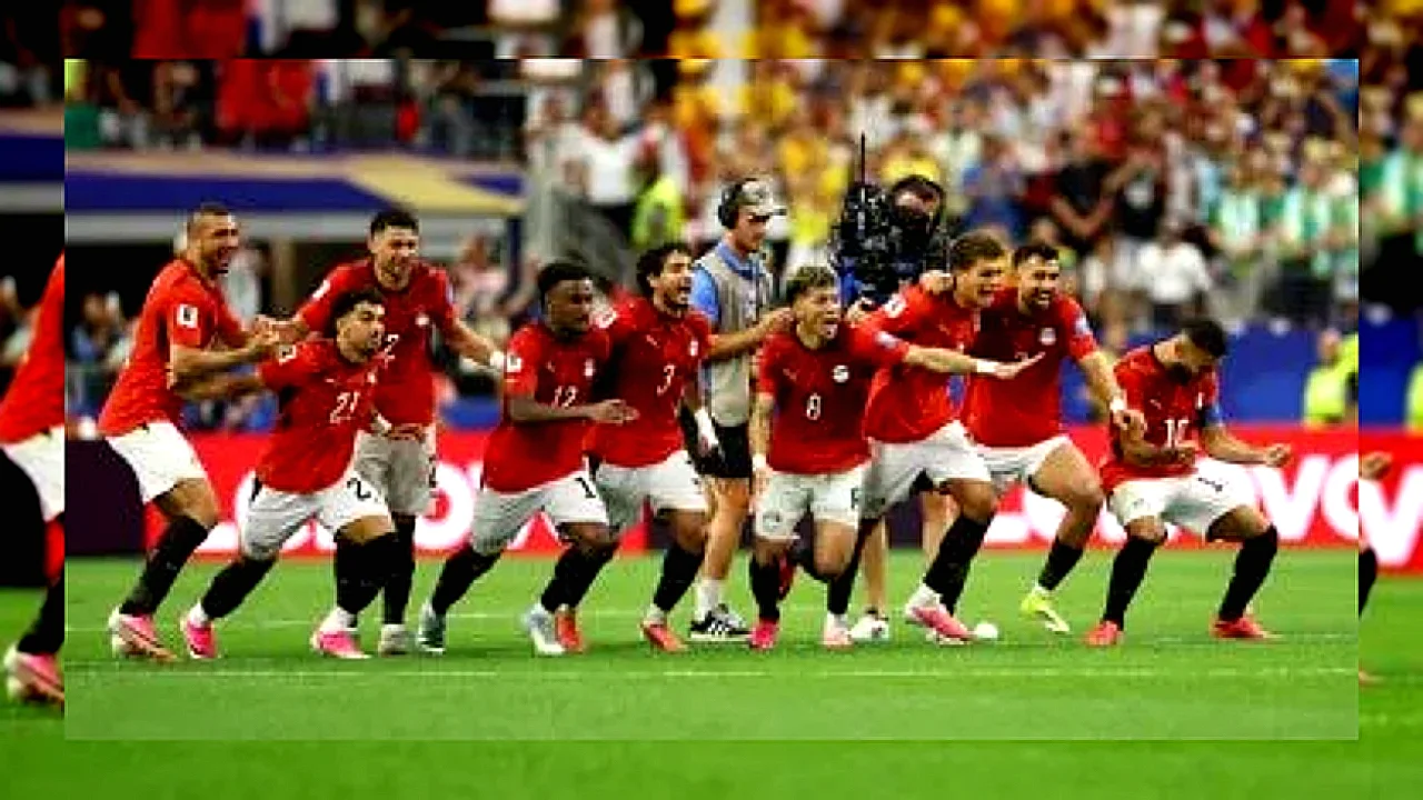سفارة السودان بالقاهرة علم مصر وشعار منتخب مصر لكرة القدم